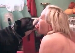 Lovely babe is kissing a beast